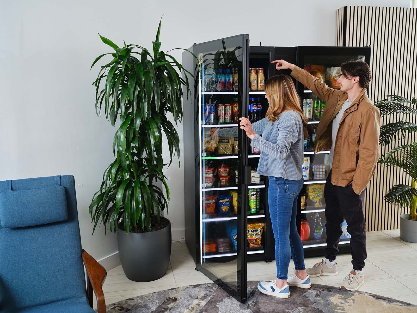 A mother and son shop at a Smart Store.